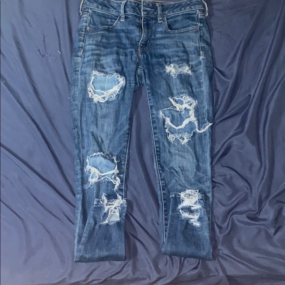 Ripped blue jeans